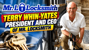 Terry Whin-Yates, President and CEO of Mr. Locksmith, holding a YouTube Silver Creator Award